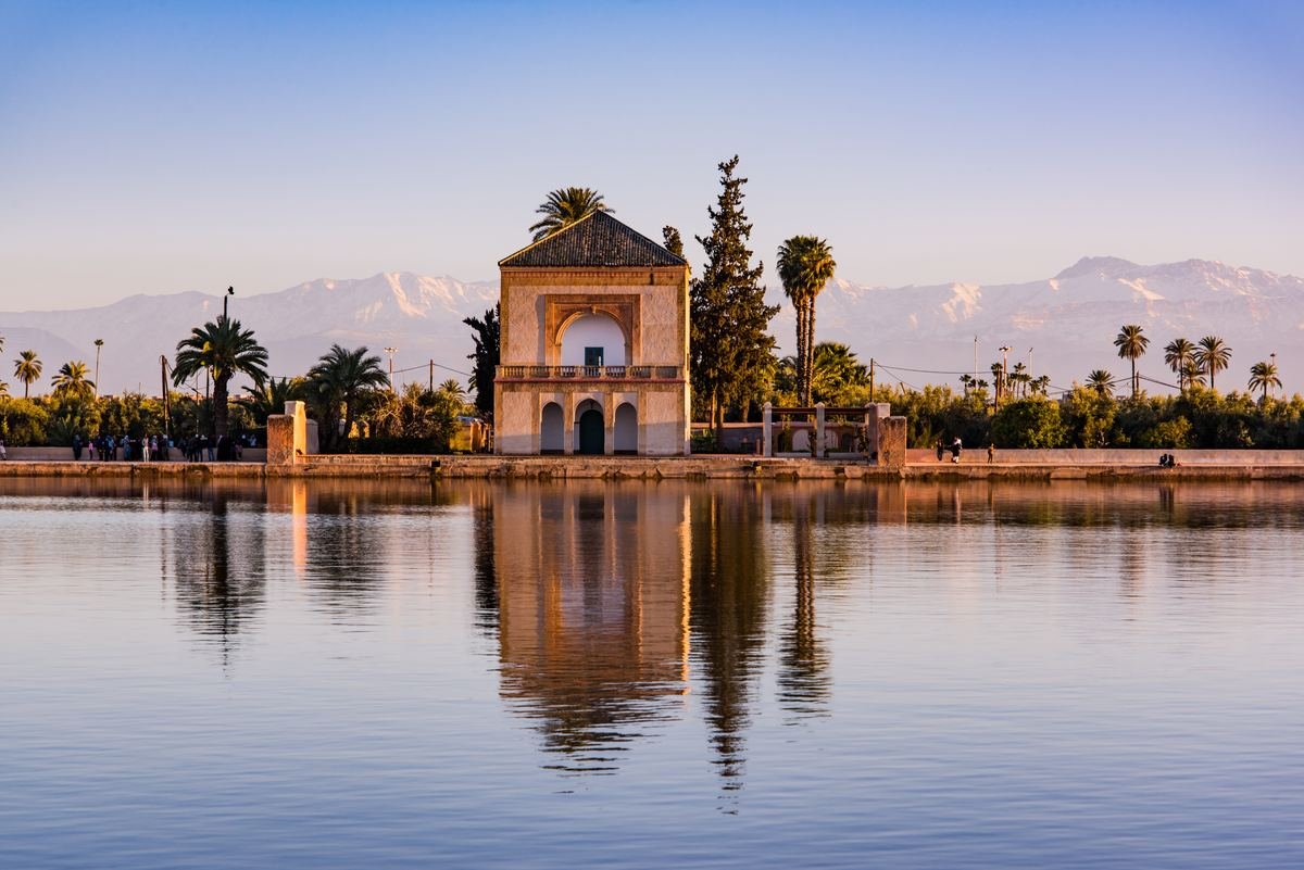 Menara Gardens pavilion with the snow-capped Atlas Mountains behind